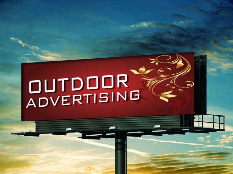 High-visibility unipole and hoarding advertising in Thane showcasing brands along busy Ghodbunder Road, capturing Mumbai’s expanding consumer market.