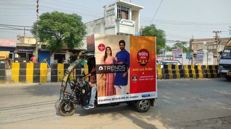 Branded auto rickshaws delivering high-impact mobility advertising across Faridabad.