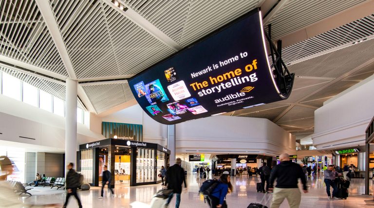 key advantages of advertising at domestic airports versus international airports