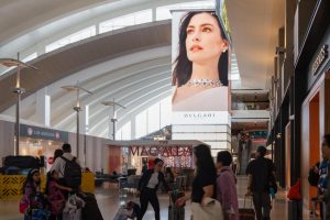 how does airport advertising help brands reach high-value and premium audiences
