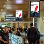 How do digital airport advertisements differ from static airport advertisements in terms of effectiveness