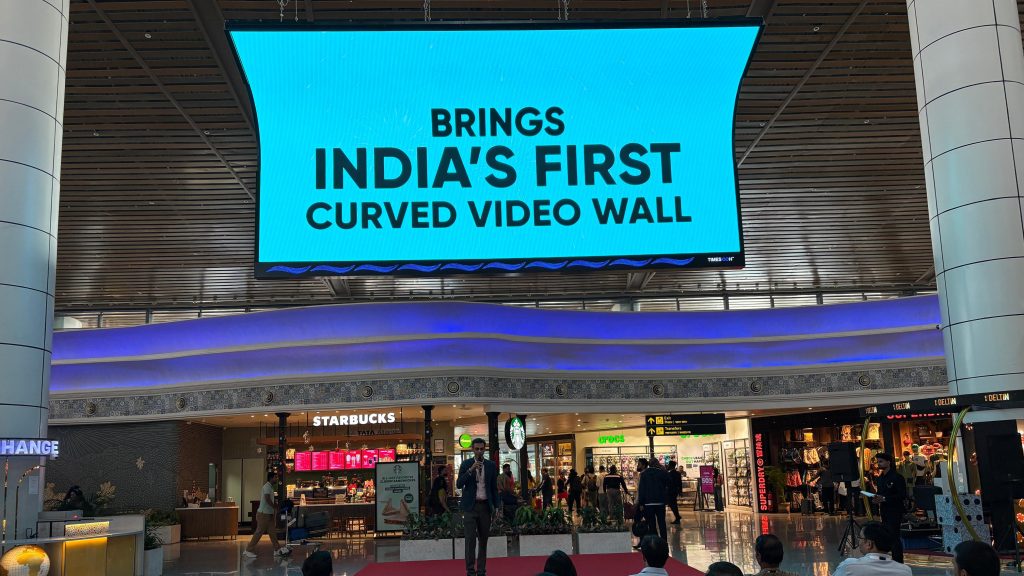 Times OOH curved digital videowall at Manohar International Airport introduces immersive DOOH advertising for brands.