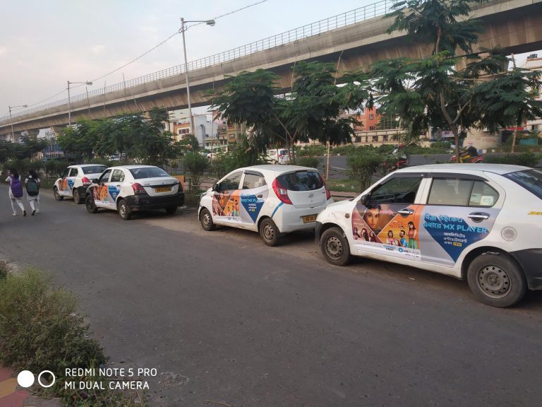 car branding Kolkata, taxi advertising Kolkata, Ola cab branding, Uber cab advertising, cab branding India, MyHoardings