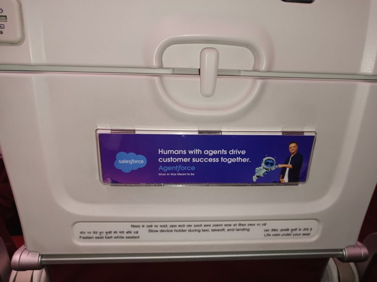 Salesforce inflight seatback advertising campaign on Air India showcasing premium branding targeting business travelers and frequent flyers