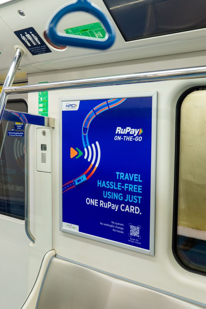 RuPay metro train interior branding in Bengaluru showcasing full-scale transit advertising campaign by MyHoardings