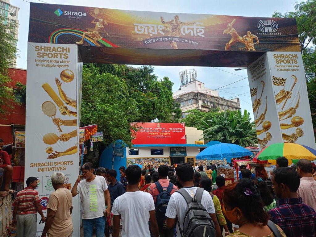 Kolkata Durga Puja 2025 pandal branding and outdoor advertising showcasing major brand campaigns during the festive season