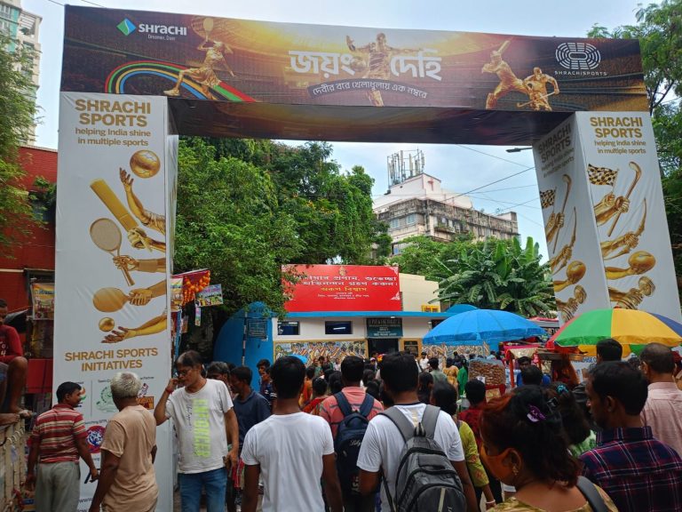 Kolkata Durga Puja 2025 pandal branding and outdoor advertising showcasing major brand campaigns during the festive season