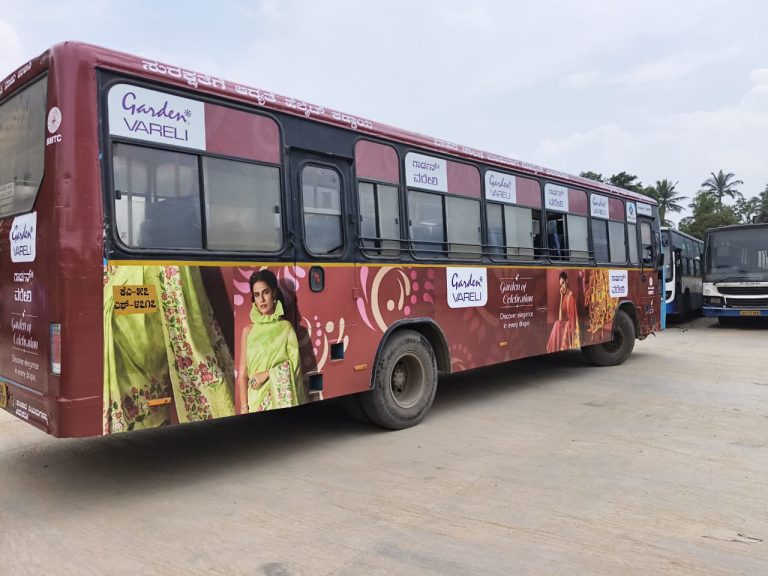 Garden Vareli BMTC bus branding in Bengaluru executed by MyHoardings showcasing elegant fashion brand visuals on moving buses